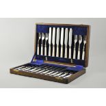 Twelve place dessert set, mother of pearl of handles with silver ferrules, walnut case,