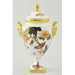 Coalport amphora shape vase, with rams head handles, designed with birds amongst flowering foliage,