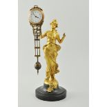 Edwardian gilt wood and metal mystery mantel clock, designed as a lady holding a mace,