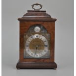 Pearce &  Son, "Elliott" mantel clock in walnut case, height 29cm.