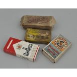Case of old beer mats and cigarette boxes.