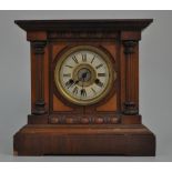Stained beechwood mantel clock, 4 1/2" circular dial with Roman numerals, bracket feet,