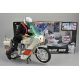 Action Man Police Patrol Officer and motor cycle, plus three other boxed toys.