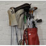 Wilson and other Golf Clubs, containing two leatherette bags, (a quantity).