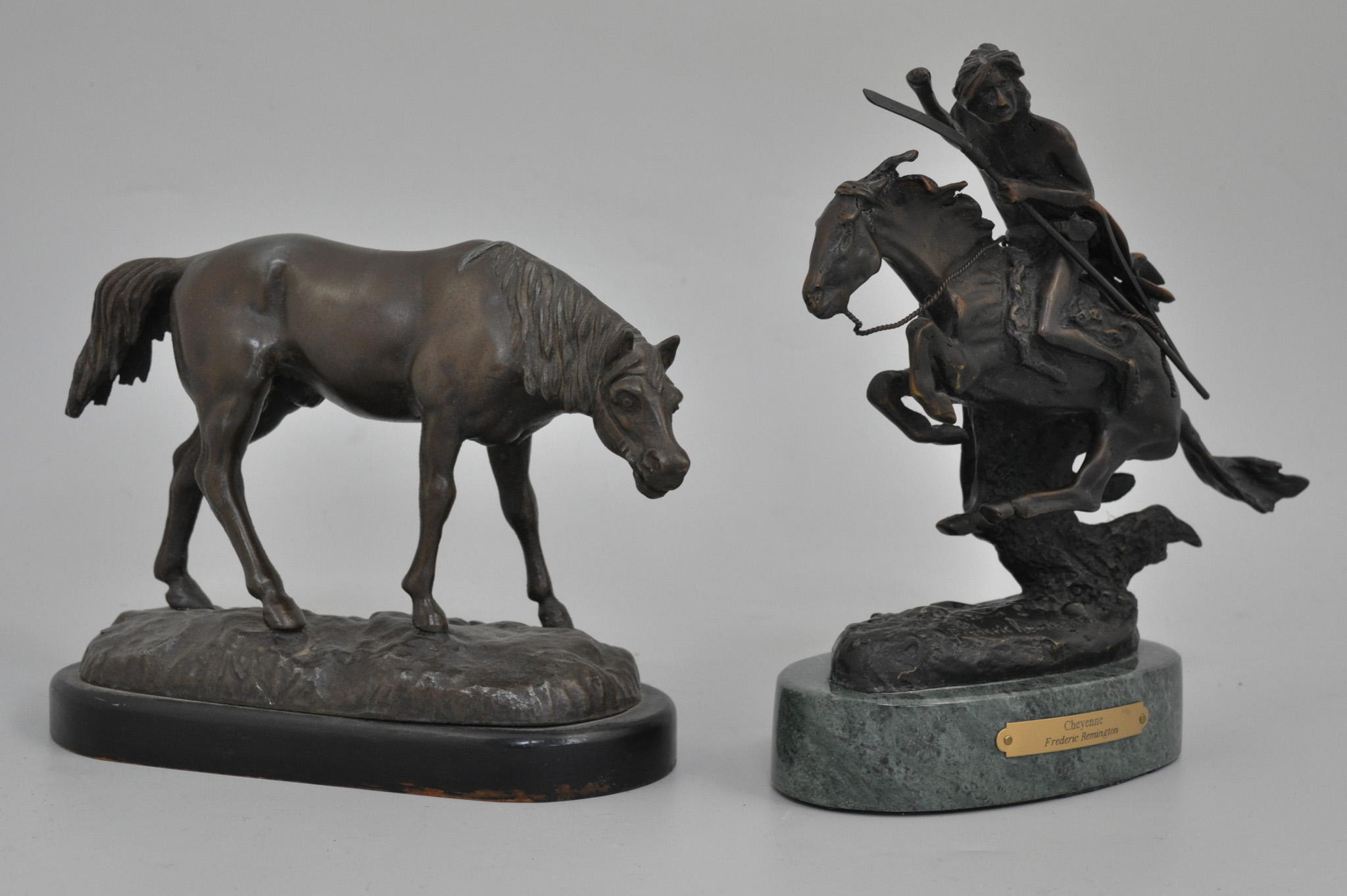 After F Remington, bronzed figure titled "Cheyenne" on marble plinth,