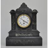 French black marble mantel clock, white circular dial, key and pendulum present.