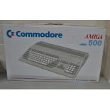 Commodore Amiga 500, (adjusted to 1000), Computer, disk reader, joystick, Amiga 520 Games,