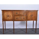 Reproduction Regency style mahogany sideboard, serpentine top with crossbanding and a reeded edge,