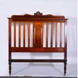 Victorian mahogany double bedstead, arched mouldings.