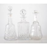 Pair of Edwardian cut glass decanters, 25cm, six other decanters and three Champagne glasses, (11).