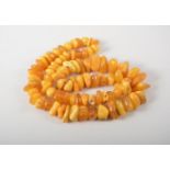 Butterscotch amber rough bead necklace, graduating from 10mm to 20mm, 62cm long,