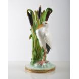 English bone china spill vase, modelled as a wading bird by bullrushes,