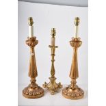 Silver plated Corinthian column table lamp, height 47cm to fitment and three giltwood table lamps,