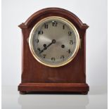 Mahogany cased twin train mantel clock, striking on a gong, Arabic dial,