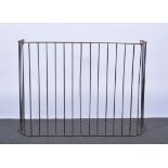 Wrought iron fire guard, bowfront, width 120cm, height 85cm.