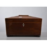 Rosewood sarcophagus shaped tea caddy, two section interior lacking bowl,