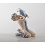 Royal Copenhagen faun with a parrot, 19cm.