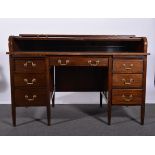 Edwardian mahogany roll top desk, tambour front enclosing pigeon holes,