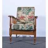 Oak framed reclining armchair, rectangular slatted back, plain arms with turned spindle sides,