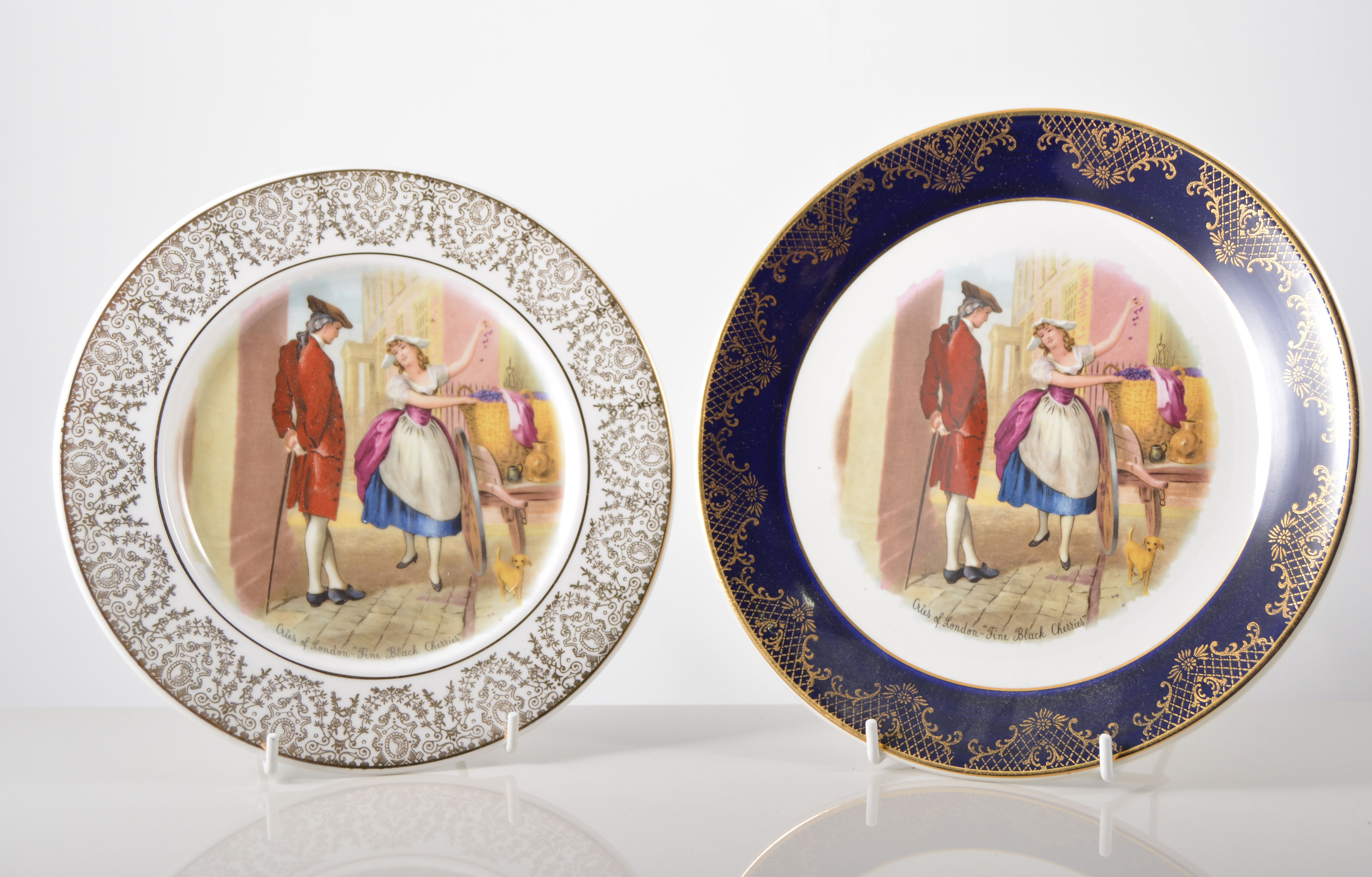 Collection of "Cries of London" plates, ten large plates, seven side plates, eight pin trays,