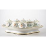 Two Continental porcelain cabaret sets each having eight lidded chocolate cups,