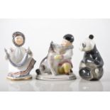 Soviet porcelain model of an Inuit with a dog, 15cm, another model of an Inuit and a panda bear,