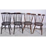 Set of four stained elm and beech kitchen chairs, turned spindle backs, circular seats,