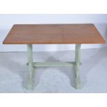 Oak kitchen table, rectangular top with rounded corners, painted trestle base, top 113cm x 62cm,