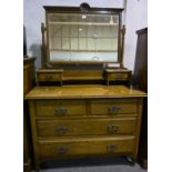 Edwardian oak dressing table, adjustable mirror with rectangular bevelled plate,