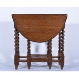 Small oak gateleg table, oval top with a moulded edge, two fall leaves, barley twist supports,