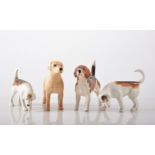 Beswick model of a Golden Labrador 9cm, three Beswick hounds and two Hummel figures,