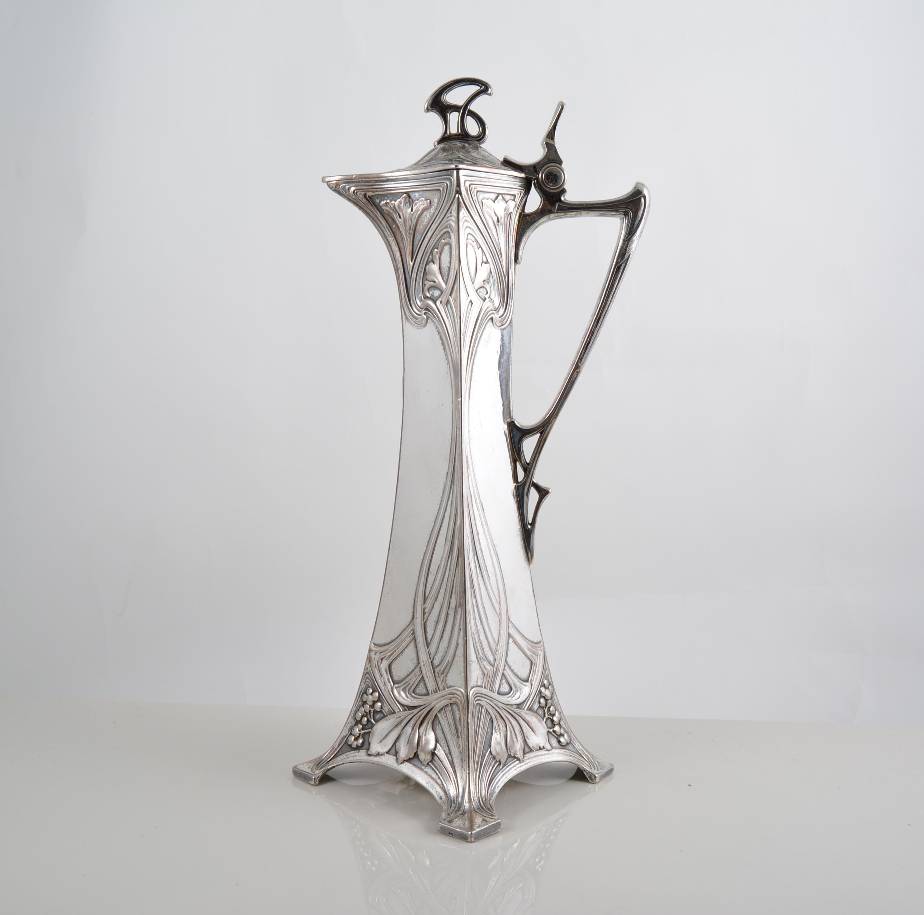 Art Nouveau electroplated claret jug, by WMF, slender tapering form with a hinged lid,