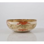 Satsuma lobed circular bowl, Kozan style, decorated with figures by a river bank, marked,