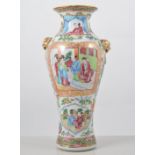 Cantonese baluster shape vase, with fixed ring mask heads to the shoulders,