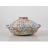 Chinese blue lined and polychrome decorated covered bowl with a profusion of flowers,
