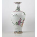 Chinese polychrome baluster shaped vase, decorated with figures in a garden setting,