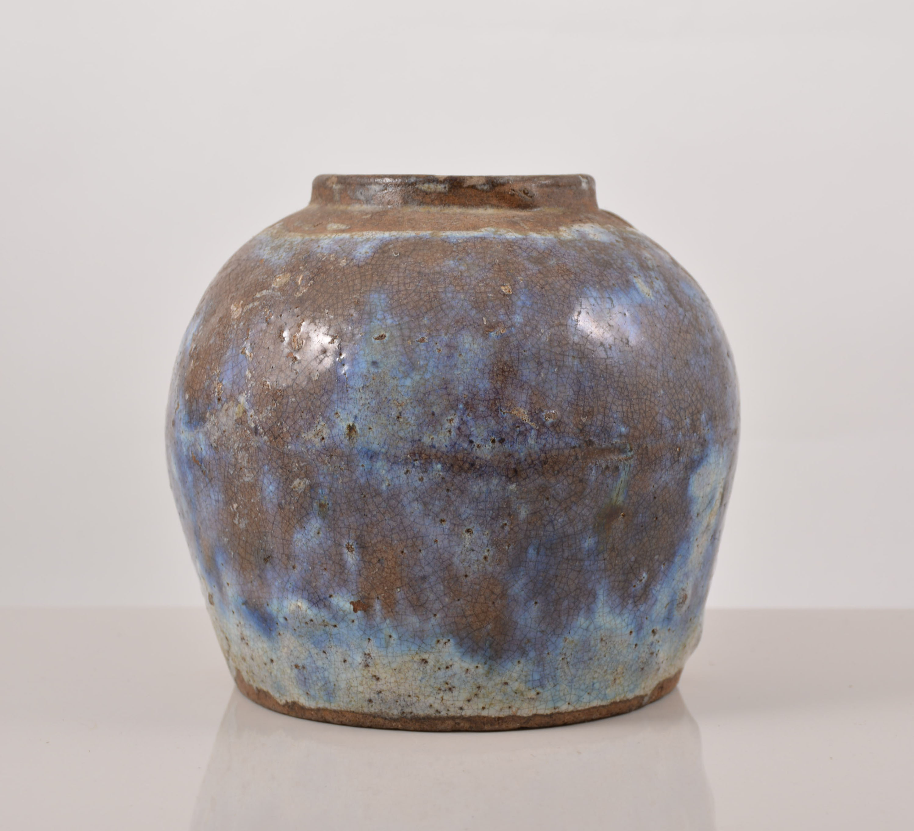 Chinese stoneware jar, cloudy flambe like near transparent glaze, bearing seal mark, 15cms.