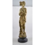 Cream painted table lamp, gilt decoration, 62cms, a bronzed seven light candelabra,