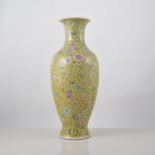 Chinese yellow ground baluster shaped vase, decorated with stylised flowers,