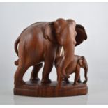 A carved hardwood Indian Elephant, pottery, jug, etc.