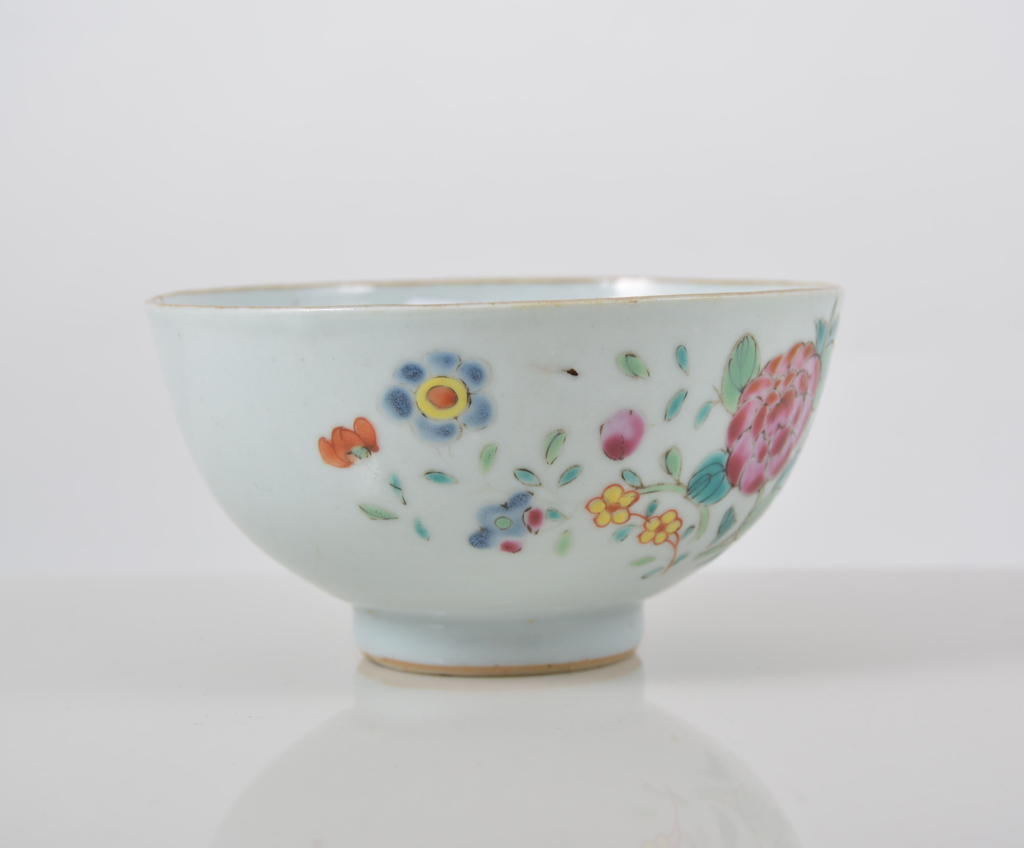 Chinese bowl, famille rose decoration of flowers and foliage, diameter 11cms.