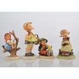 Seven Hummel figures.