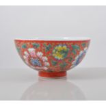 Chinese red ground bowl, decorated with stylised Chrysanthemums,