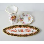 A Royal Crown Derby Imari pattern miniature cup and saucer, No 2451, a boat shape tray, No 2649,