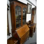 An Edwardian mahogany bureau bookcase.