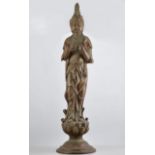 Cast metal model of a standing Deity, standing on a lotus leaf,