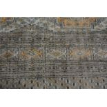 Machine made Persian pattern carpet.