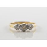 Traditional three stone diamond ring,