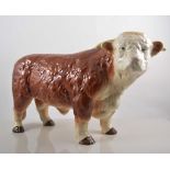 Large English pottery model of a Hereford Bull, indistinctly marked, possibly Melba ware, 27cm.