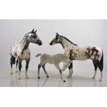 Two Beswick models of Piebald Horses, 22cm and a Beswick rocking horse grey foal, (3).